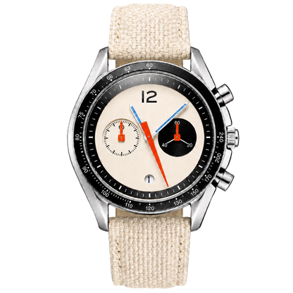 A wristwatch with a silver-toned metal case, a black tachymeter bezel, a cream-colored dial with black and orange details, and a textured beige fabric strap, shown against a solid black background.